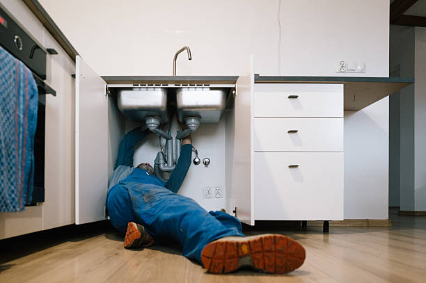 Professional Plumbing technician working in North Hills, NY